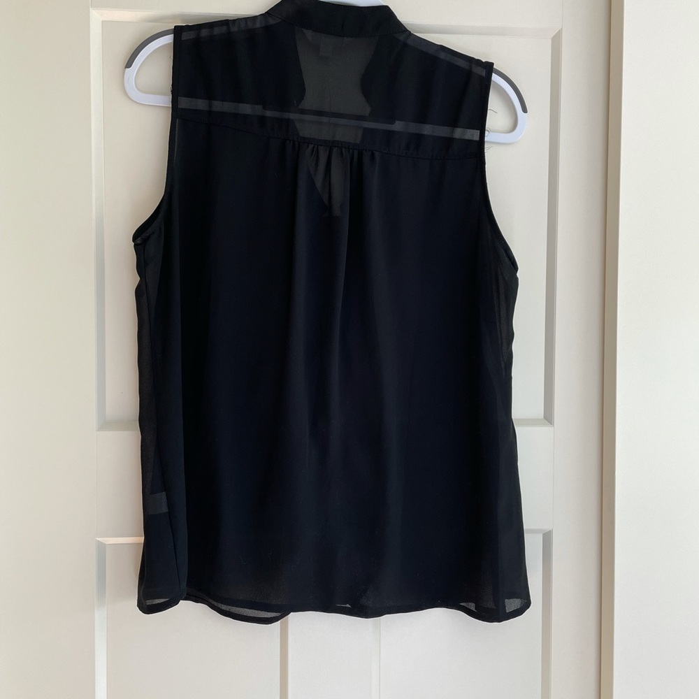 Black sleeveless blouse with ruffle, size Large. - Picture 2 of 4